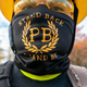 A Proud Boy displays a bandana with the phrase Stand Back, Stand By, a reference to President Trump’s statements about the group during a “Stop the Steal” rally on November 7, 2020, in Salem, Oregon.